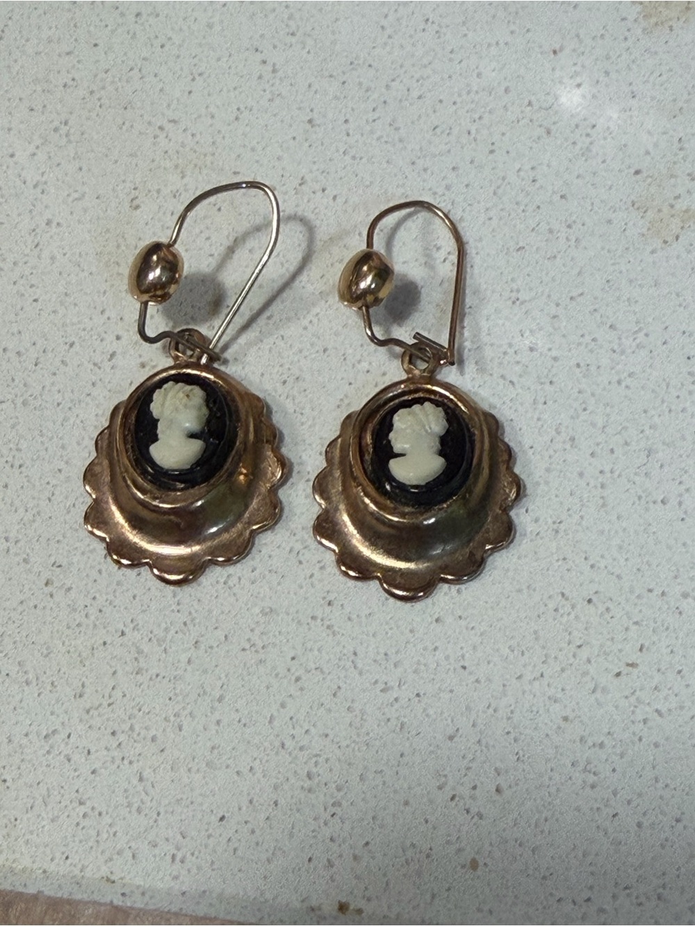 Vintage Cameo Black background on Gold scalloped setting earings looped back
